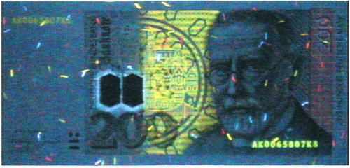 Рис. 48. Люминесценция банкноты 200 марок Германии в ультрафиолетовых лучах